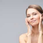 A woman admiring the results of a facelift.