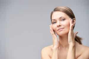 A woman admiring the results of a facelift.
