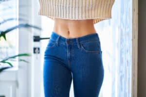 Close up of woman's slim, toned abs from tummy tuck in Houston, TX
